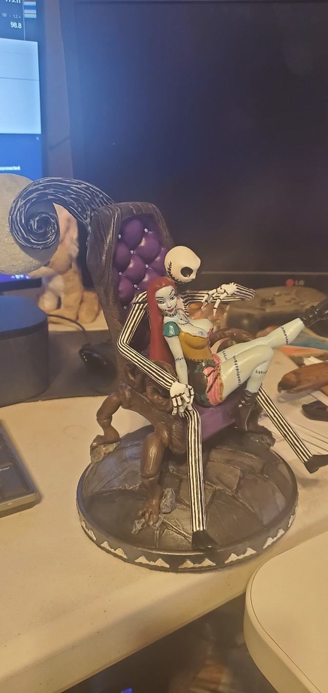 Sally nightmare before christmas figurine on chair 3D print model_3