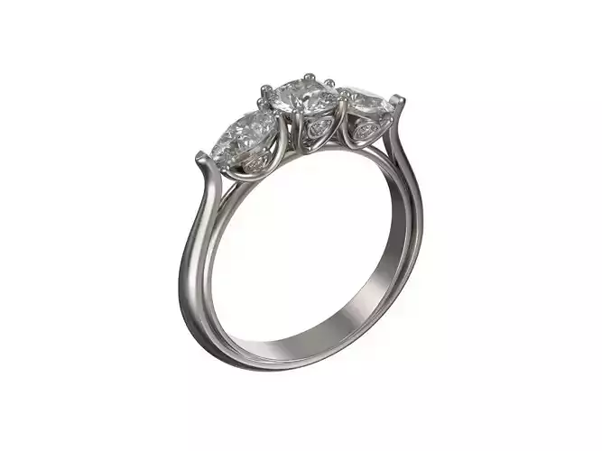Engagement golden ring with round and pear shape diamonds
