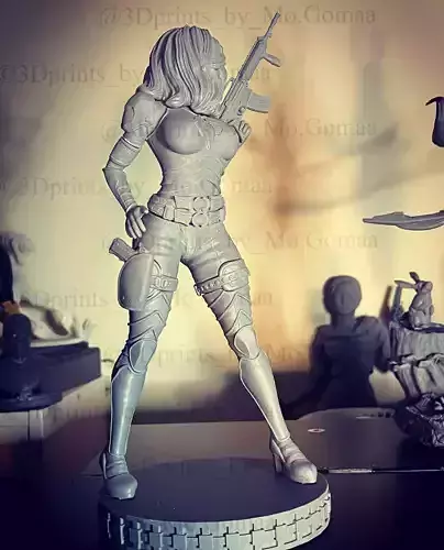 Baroness statue of woman holding gun 3D print model