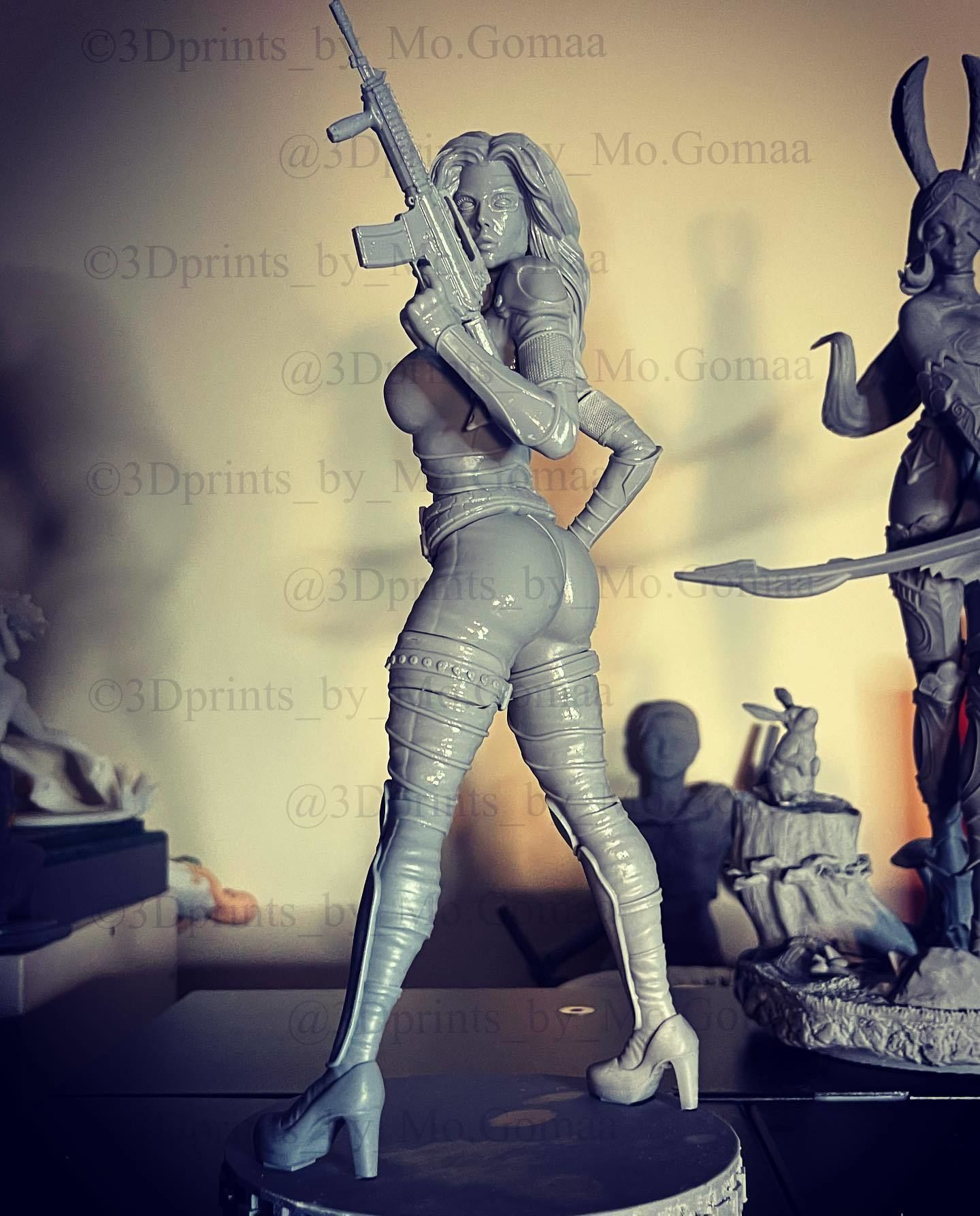 Baroness statue of woman holding gun 3D print model_2