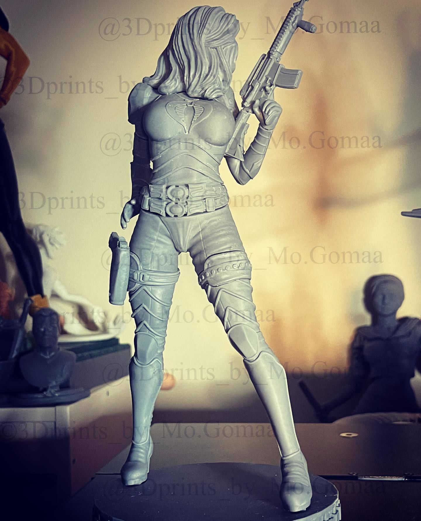 Baroness statue of woman holding gun 3D print model_1