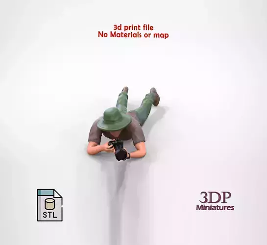 N3 photographer lying down taking photo