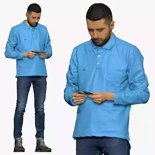 001297 man with beard in blue polo and jeans with money