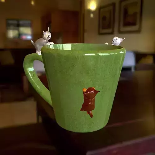 Mug surrounded by cats