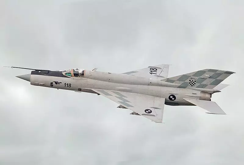 MiG-21 fighter jet flying in sky 3D model_0