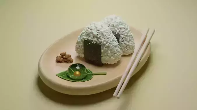 Onigiri piece of sushi on plate with chopsticks