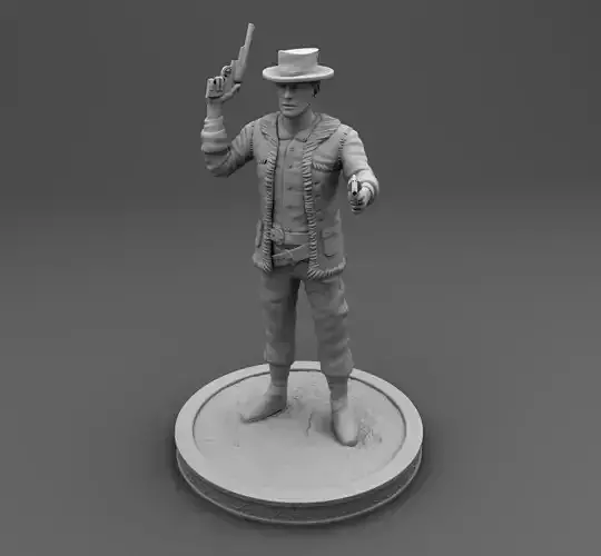 Cowboy statue of man holding gun