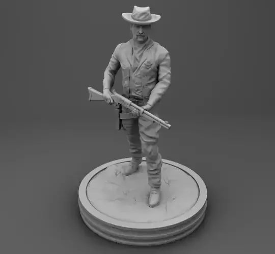 Sheriff statue of cowboy holding gun