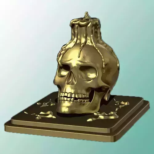 Candle melting on skull sculpture