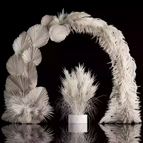 Wedding arch made of dry palm branches and pampas grass