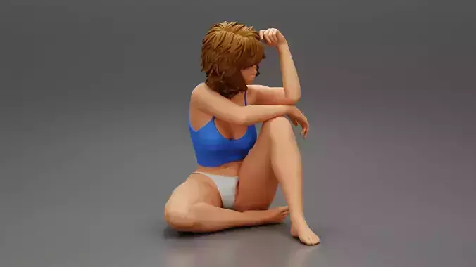 Young Female Person in Bikini Sitting