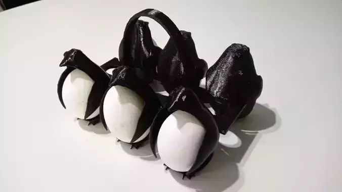 Portahuevos maple pinguinos