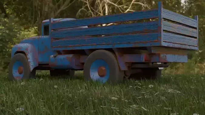 Zil-130 old rusty truck in grass