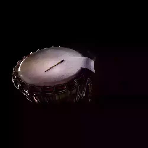 Djembe drum with piece of paper