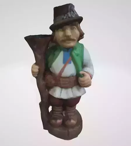 belarus figurine of man holding stick