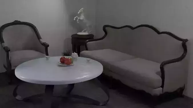 apartment living room with two chairs and table