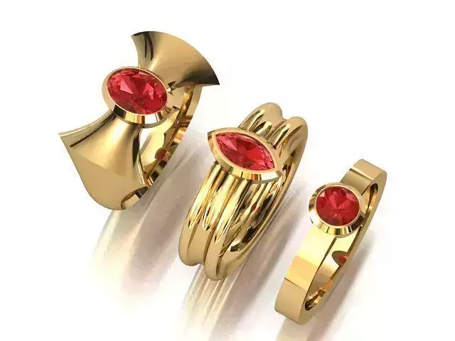 3 rings three gold with stones