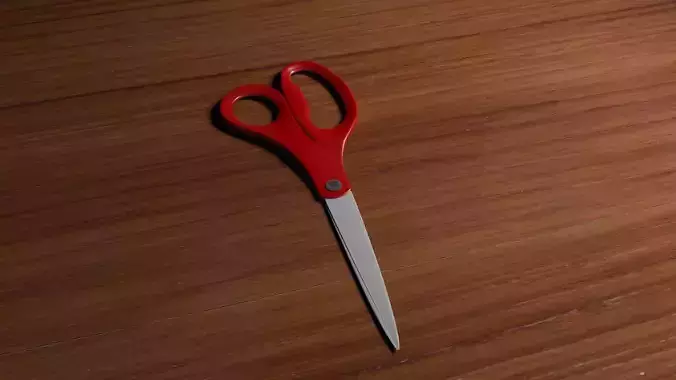 Scissors pair of on wooden table