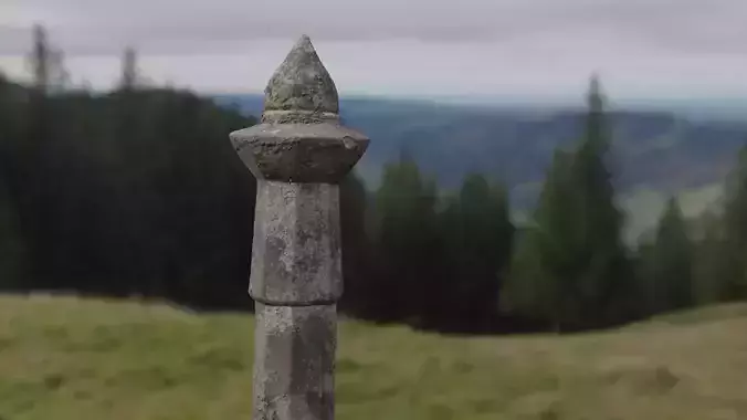A stone lantern at a cemetery in front of a closed temple site