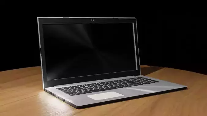 Laptop computer on wooden table