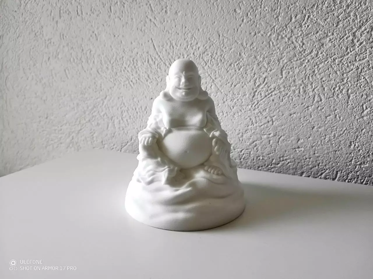 Buddha gold statue on table Free 3D print model