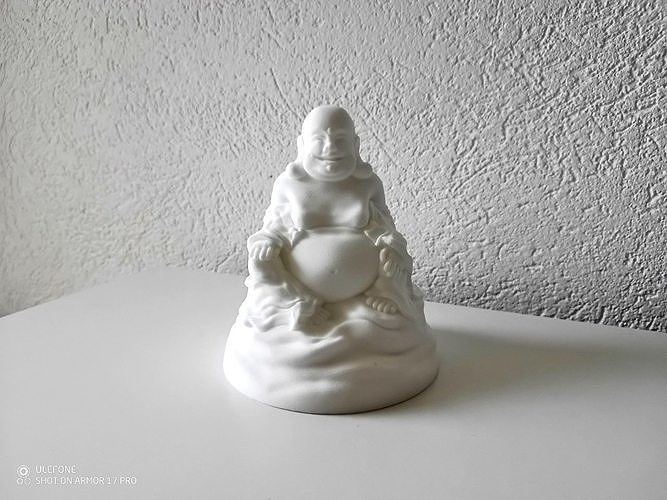 Buddha gold statue on table Free 3D print model