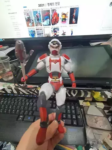 STARZINGER statue of man holding spear