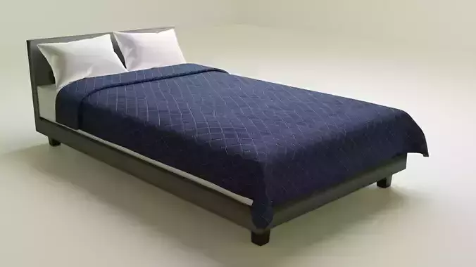 Bed with white pillows and blue duvet