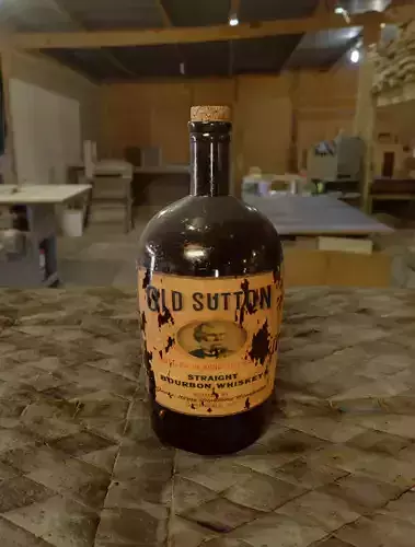 Old dusty whiskey bottle
