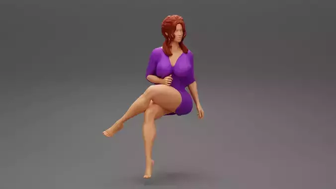 Young Elegant Woman In Mini Dress Sitting On Chair