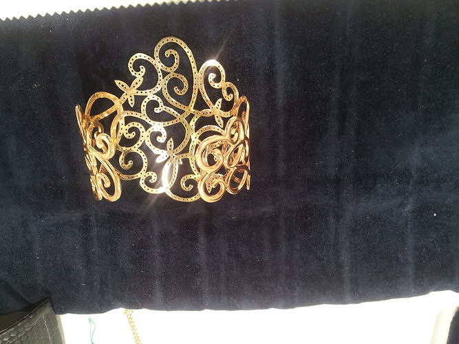 YD113 gold cuff bracelet on velvet bag 3D print model