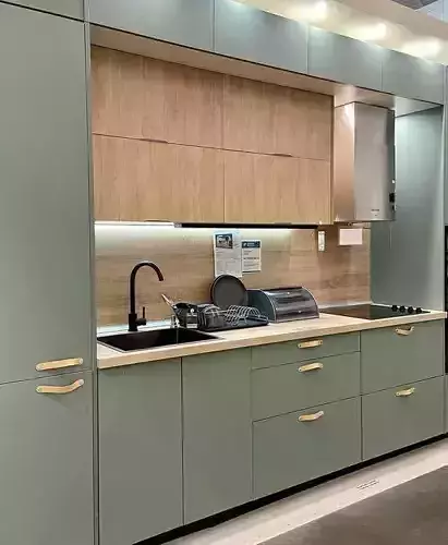 Design kitchen with cabinets and stainless steel appliances