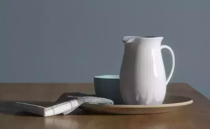 Glazed jug on a plate