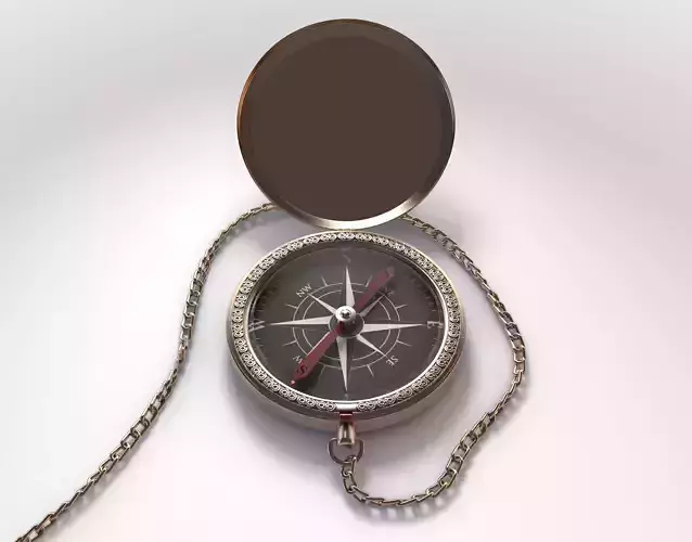 An intricate gold antique pocket watch attached to a chain