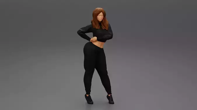 Young woman standing in sporty outfit