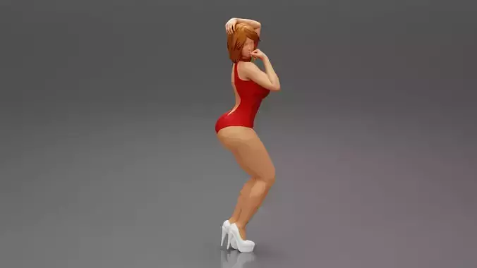 Attractive woman in one piece suit and heels posing