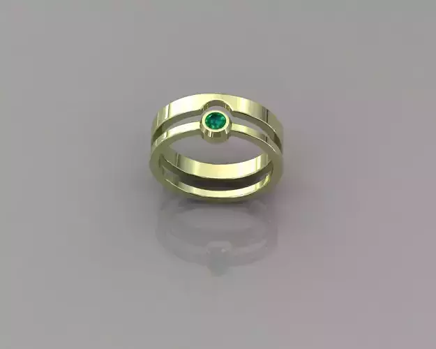 Griffin27 gold ring with emerald stone
