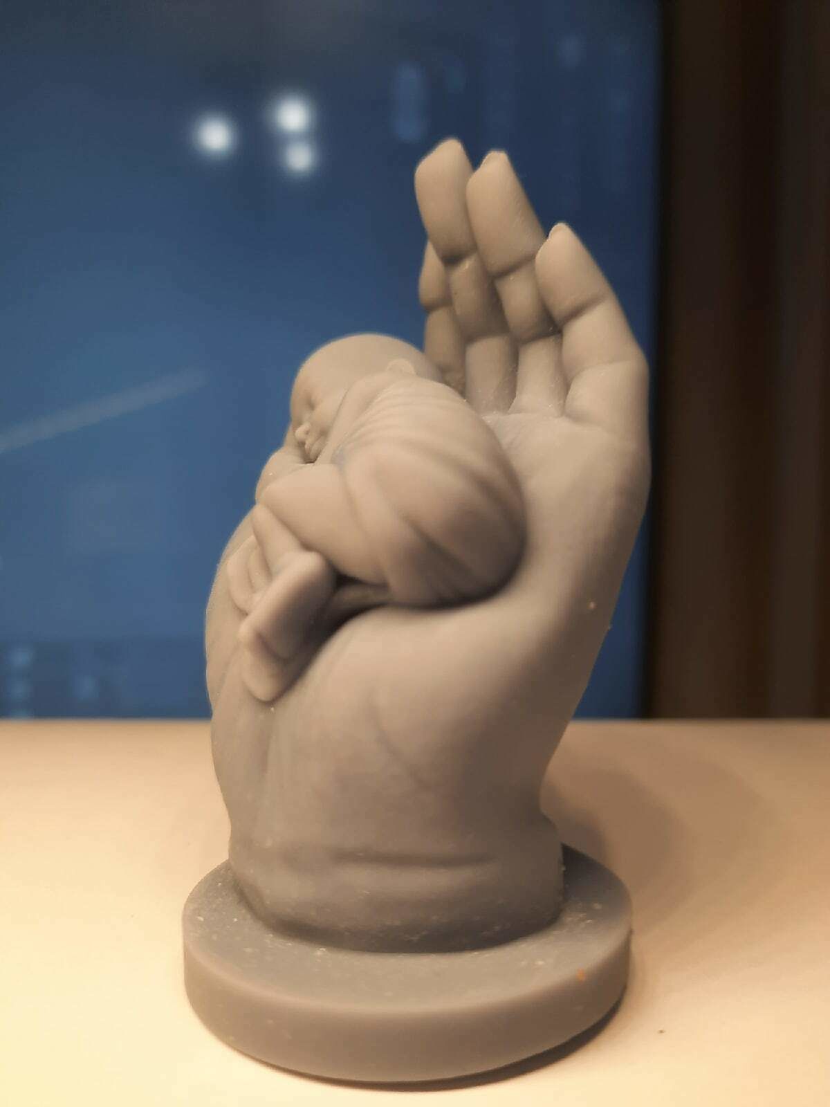 the baby is sleeping in the hand 3D print model_8