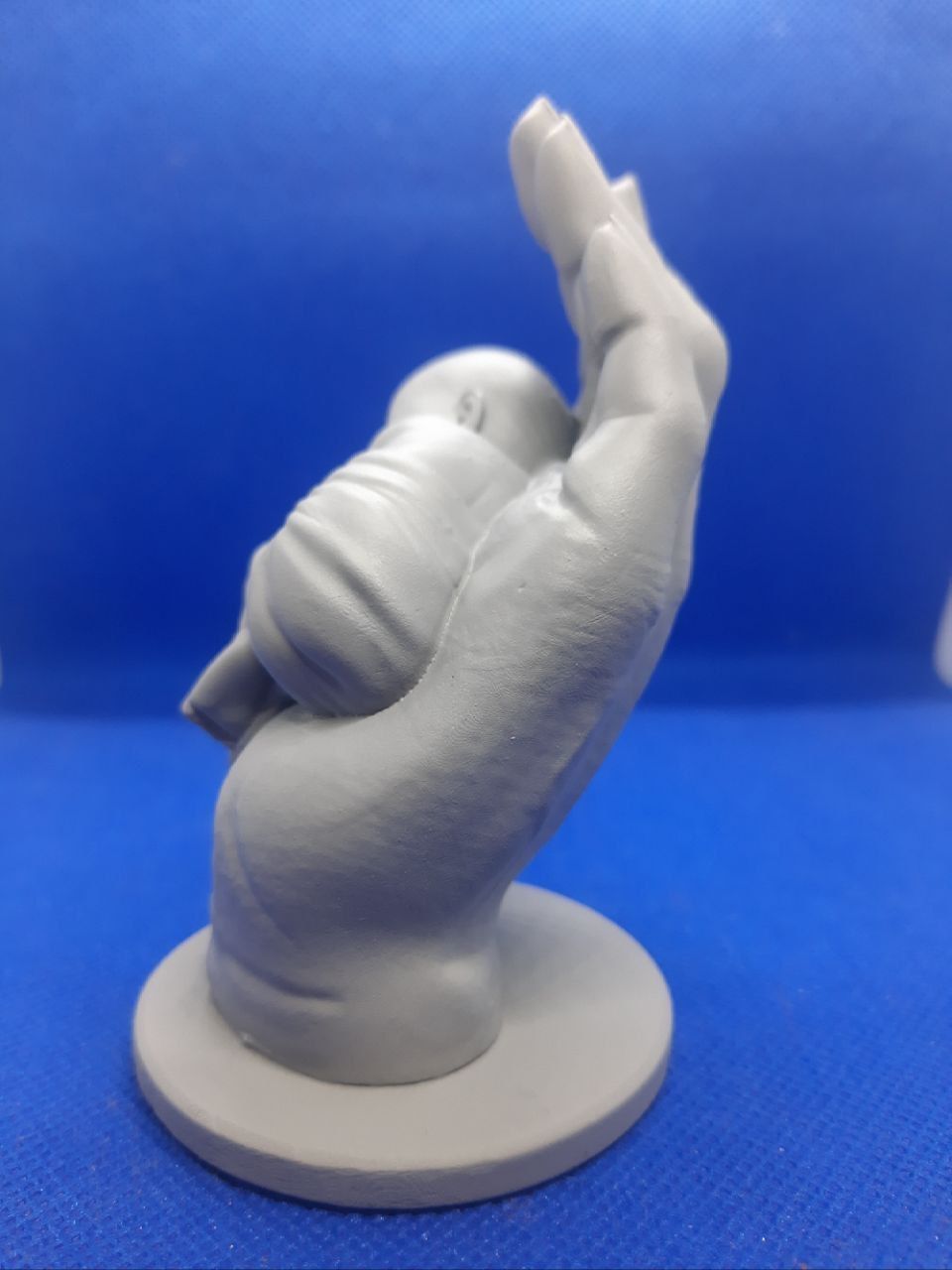 the baby is sleeping in the hand 3D print model_11
