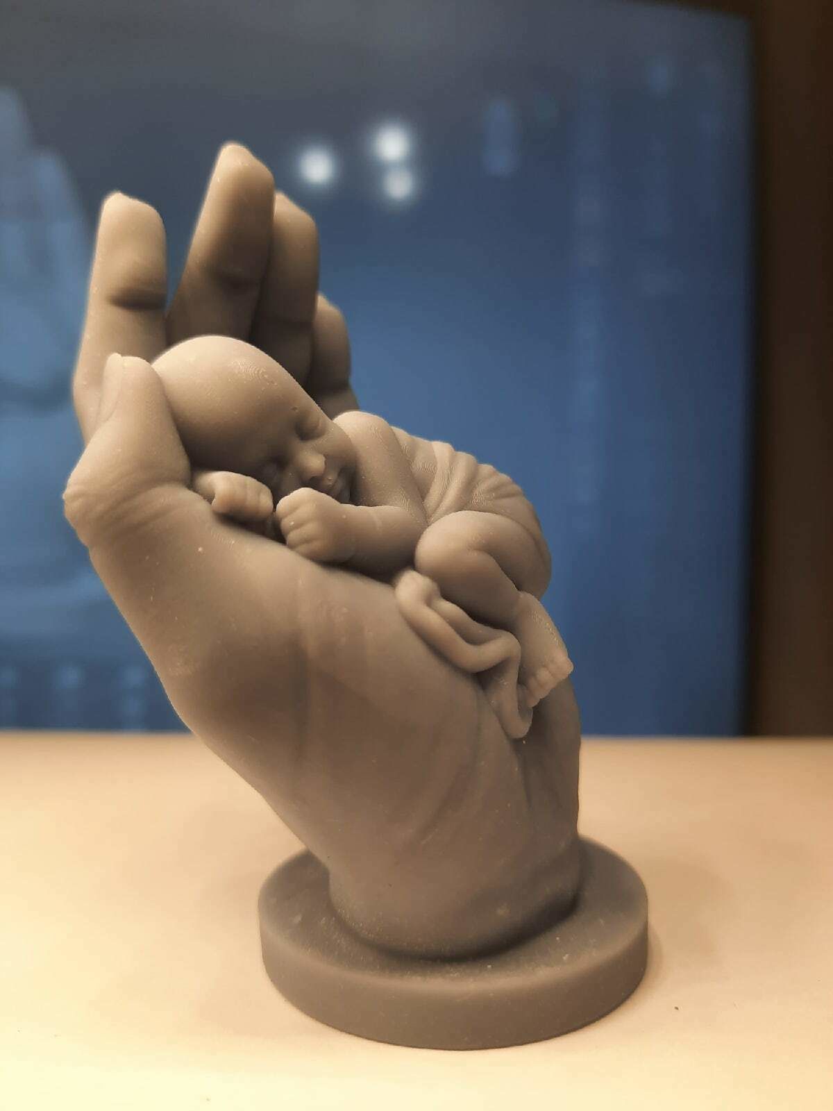 the baby is sleeping in the hand 3D print model_17