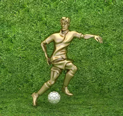 football golden soccer player kicking ball