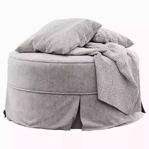 Round pouf by Howard Elliott Collection