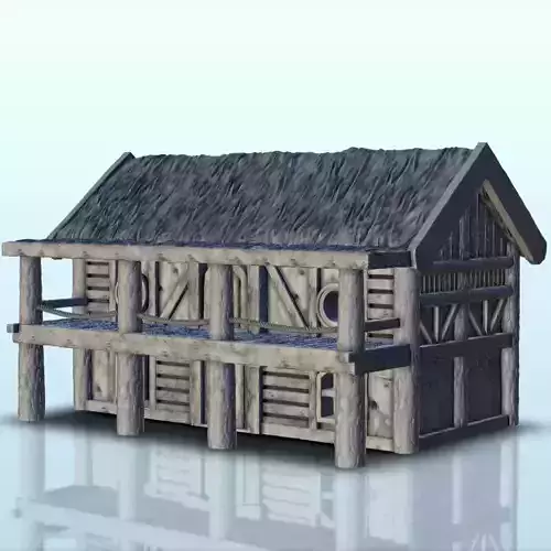 Building with thatched roof and large wooden terrace 7