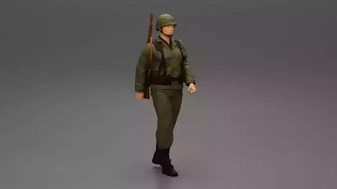 Soldier walking carrying a rifle