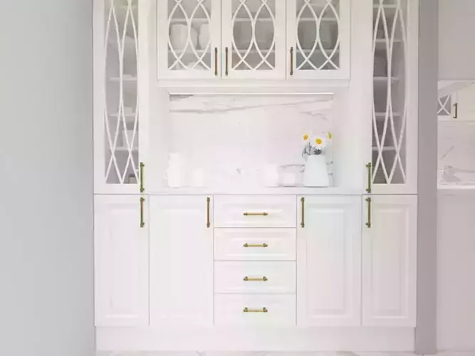 Kitchen with gold cabinetry and marble counter tops