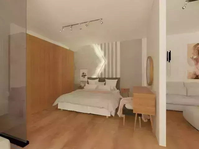 stand3 bedroom with walls and wooden floors