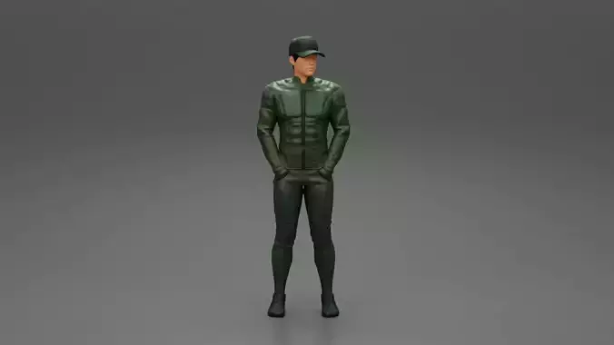 motorbiker standing with his hands in pocket