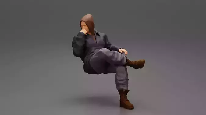 man in leather jacket sitting cross legged and thinking