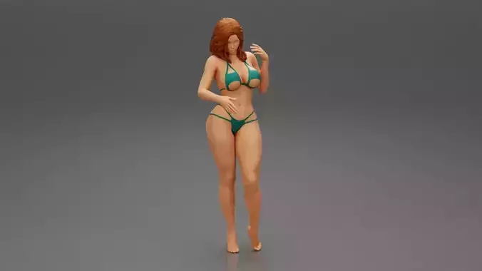 Beautiful young woman in bikini on the beach