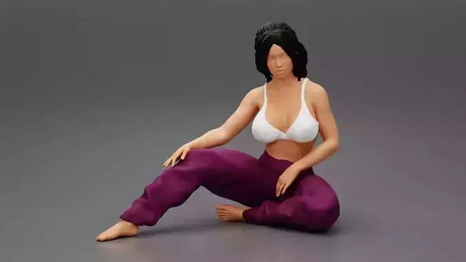 Pretty Woman In Bra And pants Sitting On The Floor